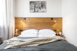 Posteľ alebo postele v izbe v ubytovaní Apartamenty Krupówki 20
