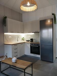 Η κουζίνα ή μικρή κουζίνα στο Panorama Apartment
