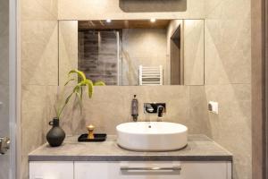 Kúpeľňa v ubytovaní Apartamenty Krupówki 20