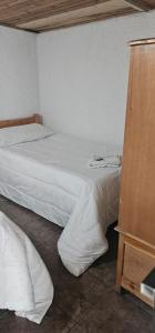 Postel nebo postele na pokoji v ubytování Portal Norte 170 ACOGEDORAS HABITACIONES CON TODOS LOS SERVICIOS