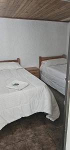 Postel nebo postele na pokoji v ubytování Portal Norte 170 ACOGEDORAS HABITACIONES CON TODOS LOS SERVICIOS