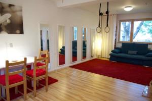 Posezení v ubytování Charmantes Appartment mit Yogastudio & Sauna