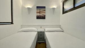 A bed or beds in a room at Jardins del mar 127 Még 17 kép