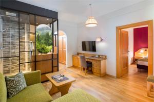 TV a/nebo společenská místnost v ubytování Hotel NockResort