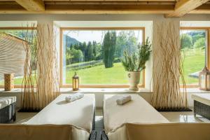 Posteľ alebo postele v izbe v ubytovaní Hotel NockResort