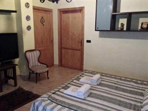 A bed or beds in a room at Encanto de Aragón
