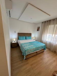 Postel nebo postele na pokoji v ubytování Luxury Family Appart 7 Pers - CheckPoint - Oujda Center