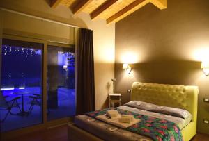 Tempat tidur dalam kamar di Agriturismo Le Fontane