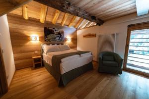 Ένα ή περισσότερα κρεβάτια σε δωμάτιο στο AGRITURISMO MONTANA FOLD
