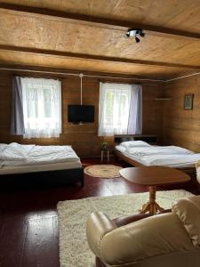 Postel nebo postele na pokoji v ubytování Sielski Kulików + 14 fotografií