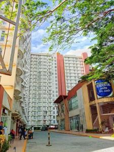 a city street with a large building in the background at The Two Captain's Place-Tagaytay Prime Residences 16th Floor UNIT 1636 in Tagaytay