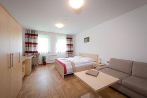 Postel nebo postele na pokoji v ubytování Resort Johanka
