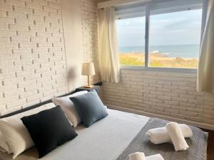 Postel nebo postele na pokoji v ubytování Portobello Suites Hotel