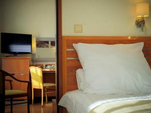 Telewizja i/lub zestaw kina domowego w obiekcie Hotel Nadmorski