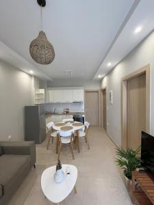 Η κουζίνα ή μικρή κουζίνα στο Astron Apartments
