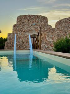 Bazén v ubytování Trullo Li Demani by Jdvacanze nebo v jeho okolí