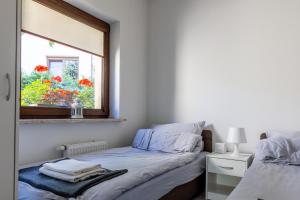 Posteľ alebo postele v izbe v ubytovaní PlumTree Holiday Apartment