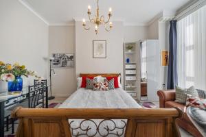 Ένα ή περισσότερα κρεβάτια σε δωμάτιο στο Modern Studio Apartment