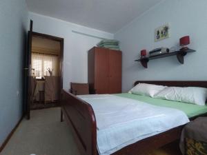 Postel nebo postele na pokoji v ubytování Igalo Apartman Despich