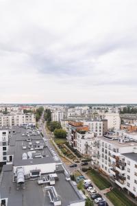 an aerial view of a city with buildings at Apartament Pełczyńskiego 3 in Warsaw