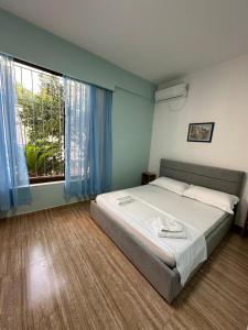 Postel nebo postele na pokoji v ubytování Las Palmas Guesthouse
