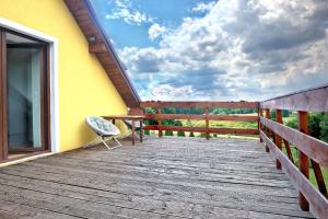Balkón alebo terasa v ubytovaní Dom relaksacyjny na Mazurach Zachodnich