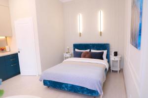 Posteľ alebo postele v izbe v ubytovaní Modern Apartment, 3mins to Opera