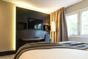 Postel nebo postele na pokoji v ubytování Lapland Hotels Oulu