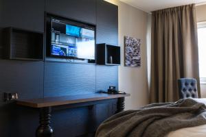 TV a/nebo společenská místnost v ubytování Lapland Hotels Oulu