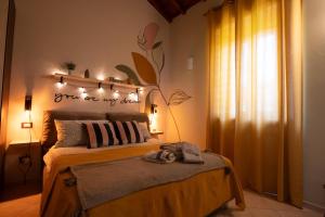 Letto o letti in una camera di Mariella sul borgo