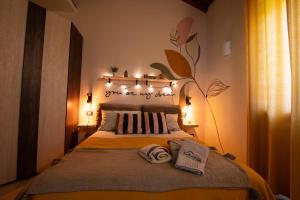Letto o letti in una camera di Mariella sul borgo