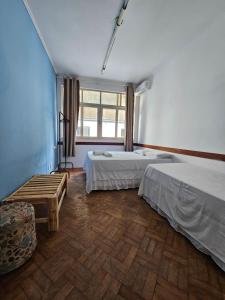 Postel nebo postele na pokoji v ubytování Nomads Hostel Multicultural & Coworking