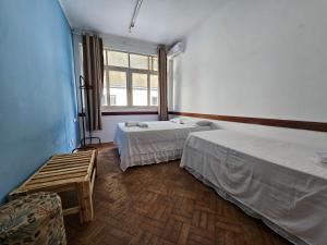 Postel nebo postele na pokoji v ubytování Nomads Hostel Multicultural & Coworking