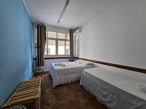Postel nebo postele na pokoji v ubytování Nomads Hostel Multicultural & Coworking