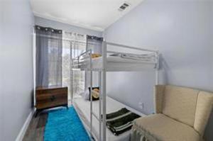 Ένα ή περισσότερα κρεβάτια σε δωμάτιο στο Wellington Updated Townhouse