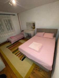 Voodi või voodid majutusasutuse Guesthouse Tomasevic toas
