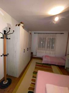 Voodi või voodid majutusasutuse Guesthouse Tomasevic toas