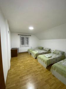 Voodi või voodid majutusasutuse Guesthouse Tomasevic toas
