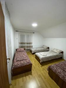 Voodi või voodid majutusasutuse Guesthouse Tomasevic toas