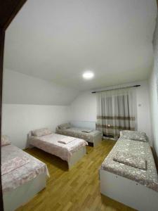 Voodi või voodid majutusasutuse Guesthouse Tomasevic toas