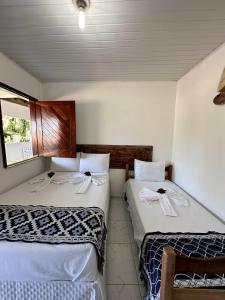 Postel nebo postele na pokoji v ubytování Mar à Vista Ilha de Boipeba