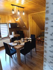 Posezení v ubytování Apartament Na Strychu Podhale