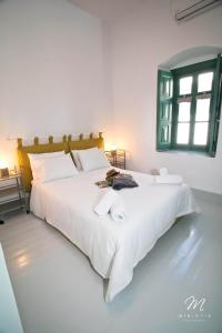 A bed or beds in a room at Scaleri Port Home