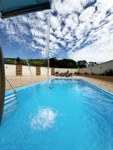 Der Swimmingpool an oder in der Nähe von Pousada Pitauá