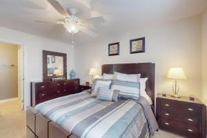 Katil atau katil-katil dalam bilik di Longs Cozy Haven