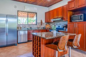 Una cocina o zona de cocina en Casa Wow