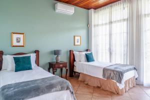 Cama o camas de una habitación en Casa Wow