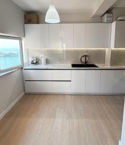 Dapur atau dapur kecil di Sea View Apartaments