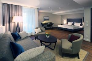 Postel nebo postele na pokoji v ubytování Hotel am Fischmarkt