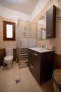 A bathroom at Melograno Apartments and Studios Még 37 kép